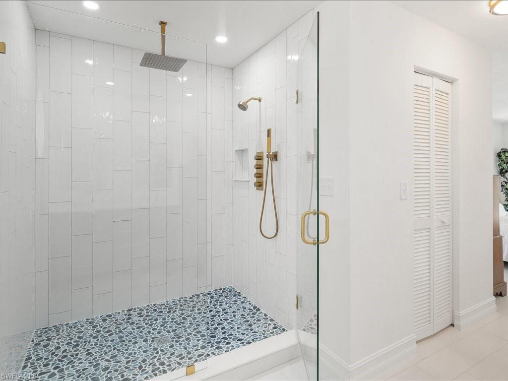 262 Torrey Pines Point Naples, FL 34113 - Photo 15 of 24 a bathroom with a shower