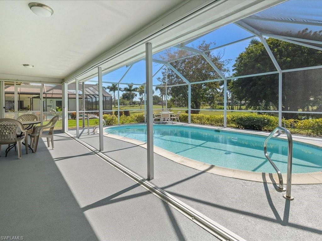 262 Torrey Pines Point Naples, FL 34113 - Photo 21 of 24 a view of a backyard