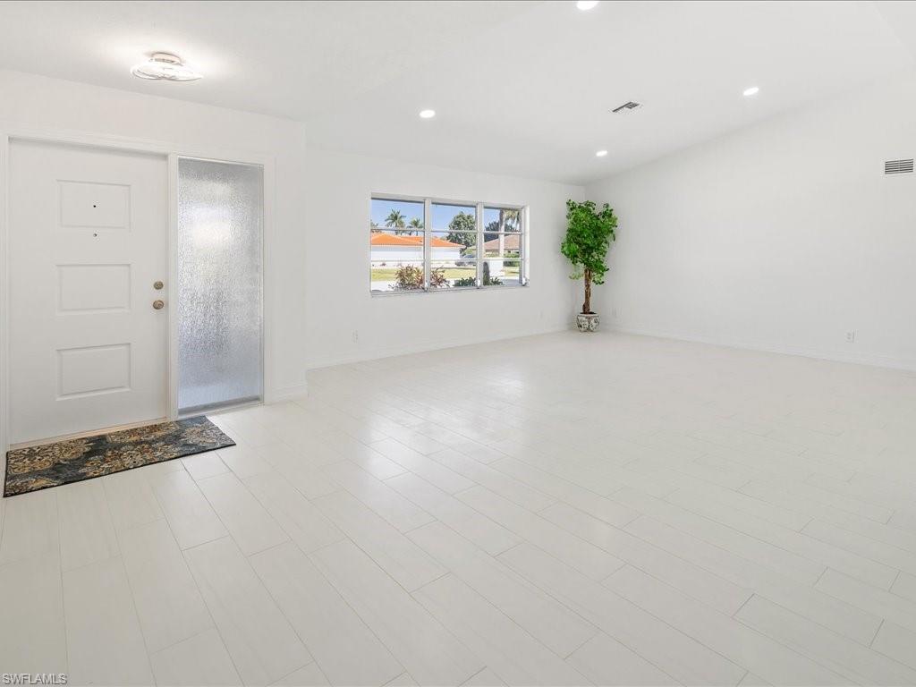 262 Torrey Pines Point Naples, FL 34113 - Photo 10 of 24 an empty room with windows and closet