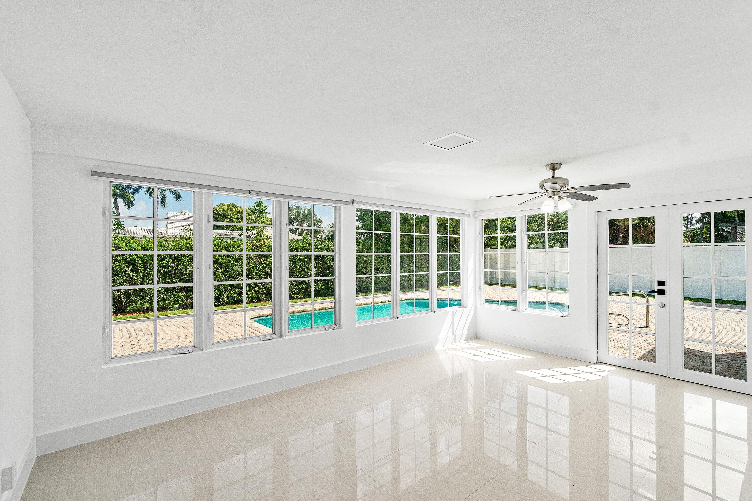 1531 Northwest 4th Street Boca Raton, FL 33486 - Photo 15 of 34 a view of a house with a swimming pool