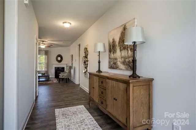 a spacious bathroom with a sink and a mirror