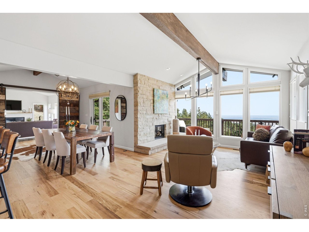 101 Canon View Road Boulder, CO 80302 - Photo 5 of 49 Beautiful living room framed by stunning views and a beautiful gas fireplace