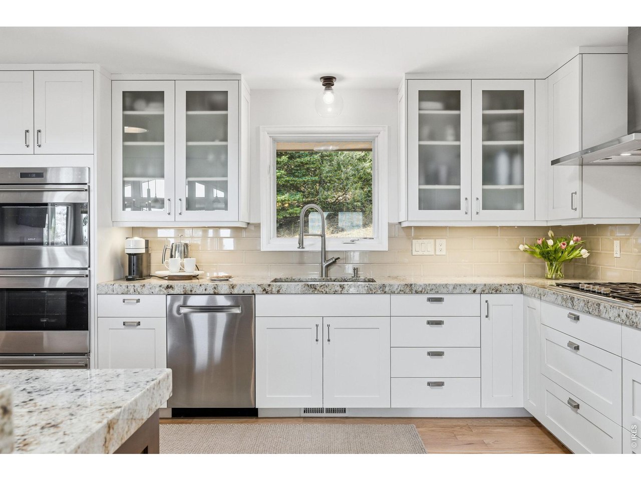 101 Canon View Road Boulder, CO 80302 - Photo 8 of 49 Equipped with double ovens and a picturesque window over the sink