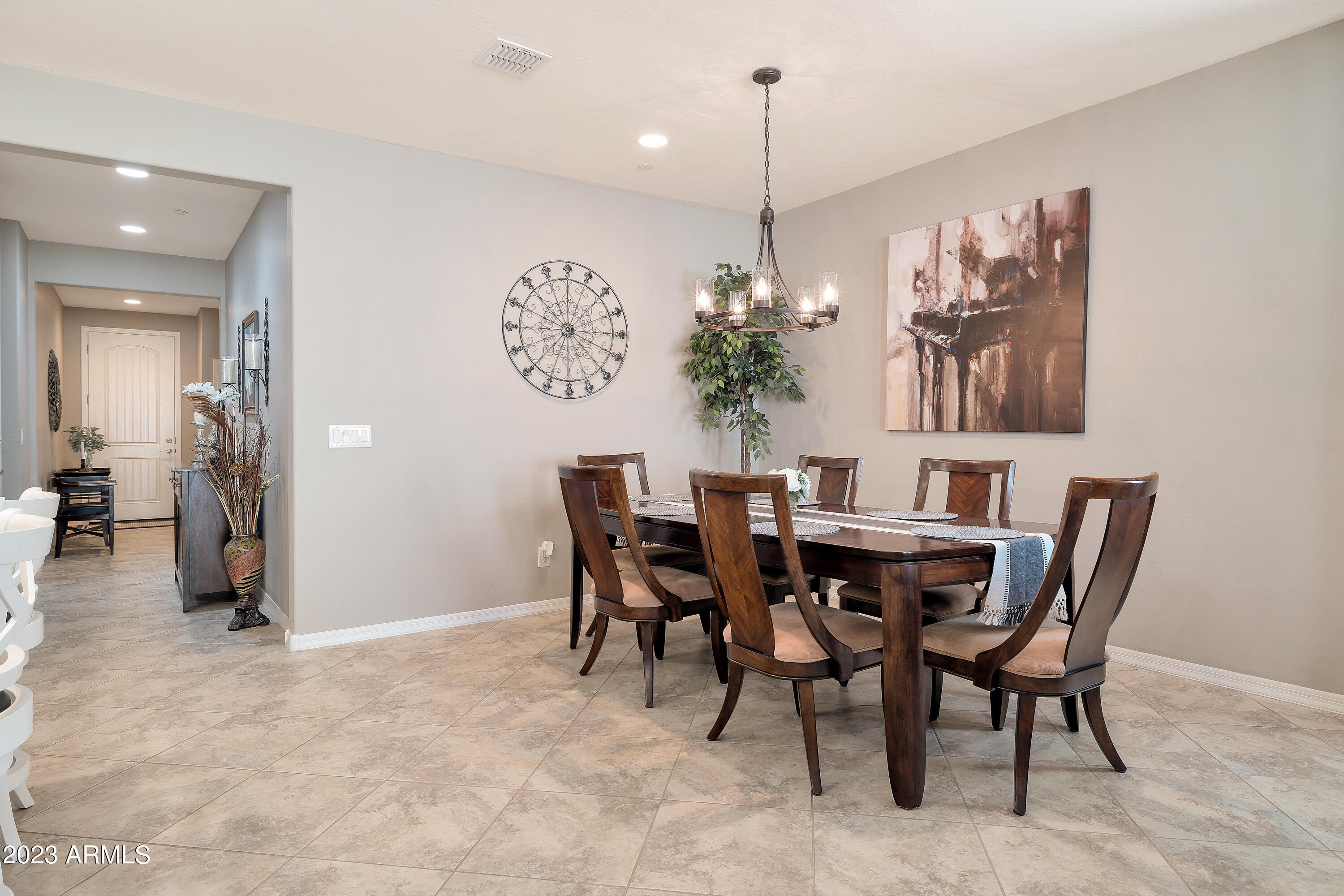 21218 West Granada Road Buckeye, AZ 85396 - Photo 9 of 34 a view of a dining room with furniture