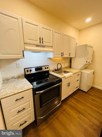 a view of a kitchen with stove