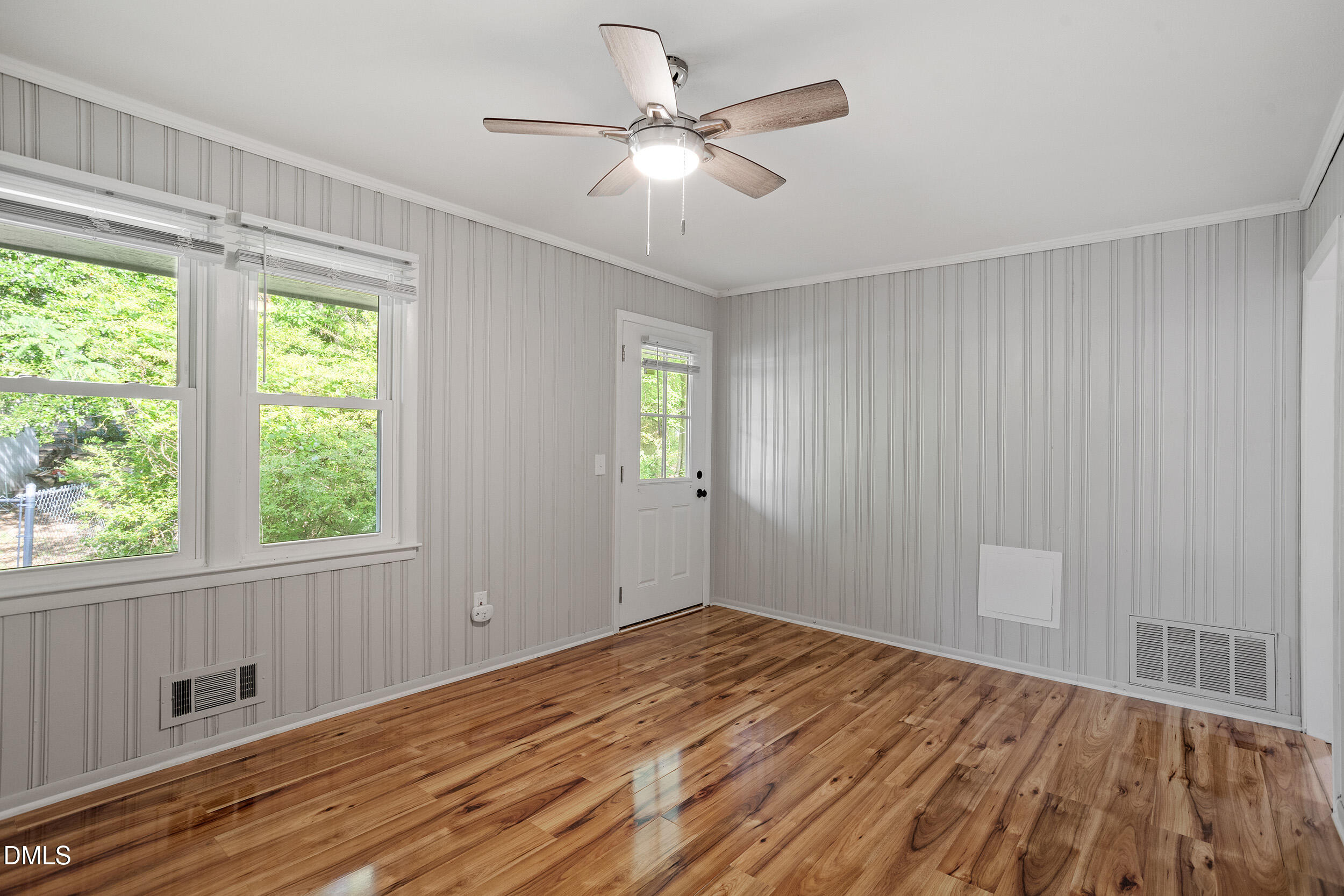 2414 Chapin Street Durham, NC 27707 - Photo 16 of 30 a view of empty room with wooden floor and fan