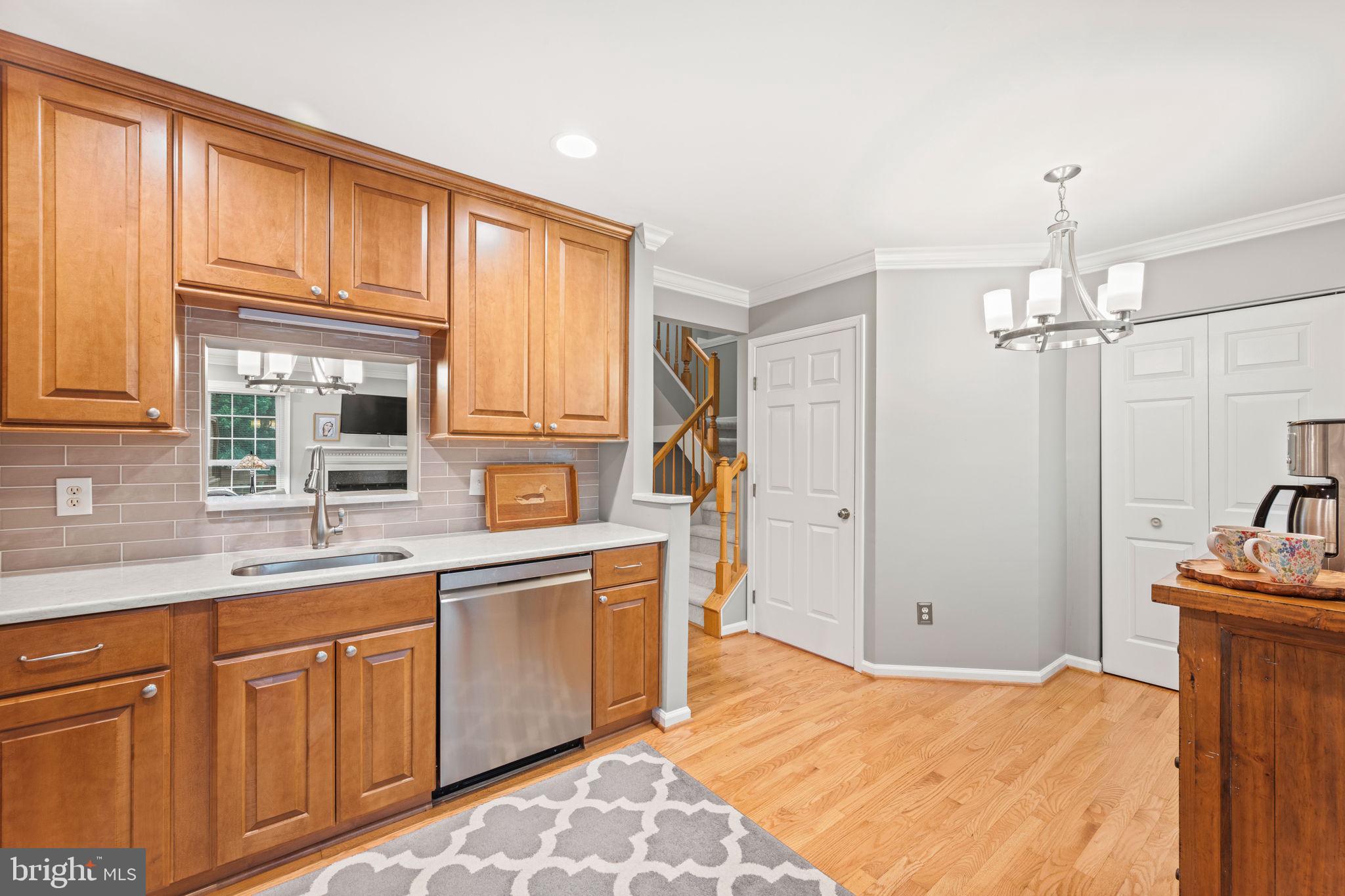 913 Rolfe Place Alexandria, VA 22314 - Photo 15 of 49 Left door is powder rm, right door is pantry