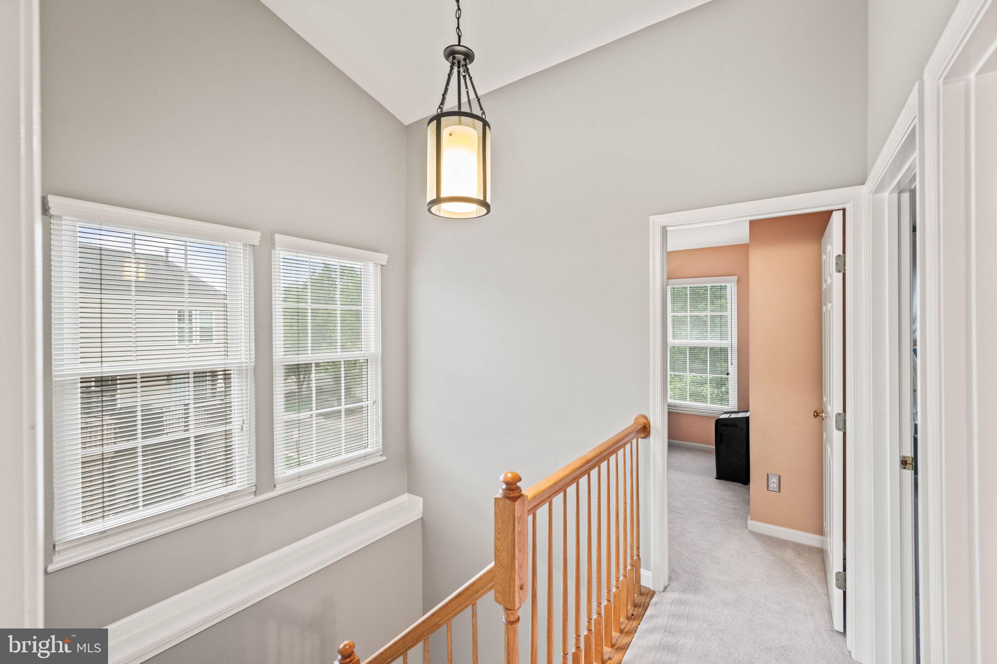 913 Rolfe Place Alexandria, VA 22314 - Photo 25 of 49 Upstairs hall is light filled