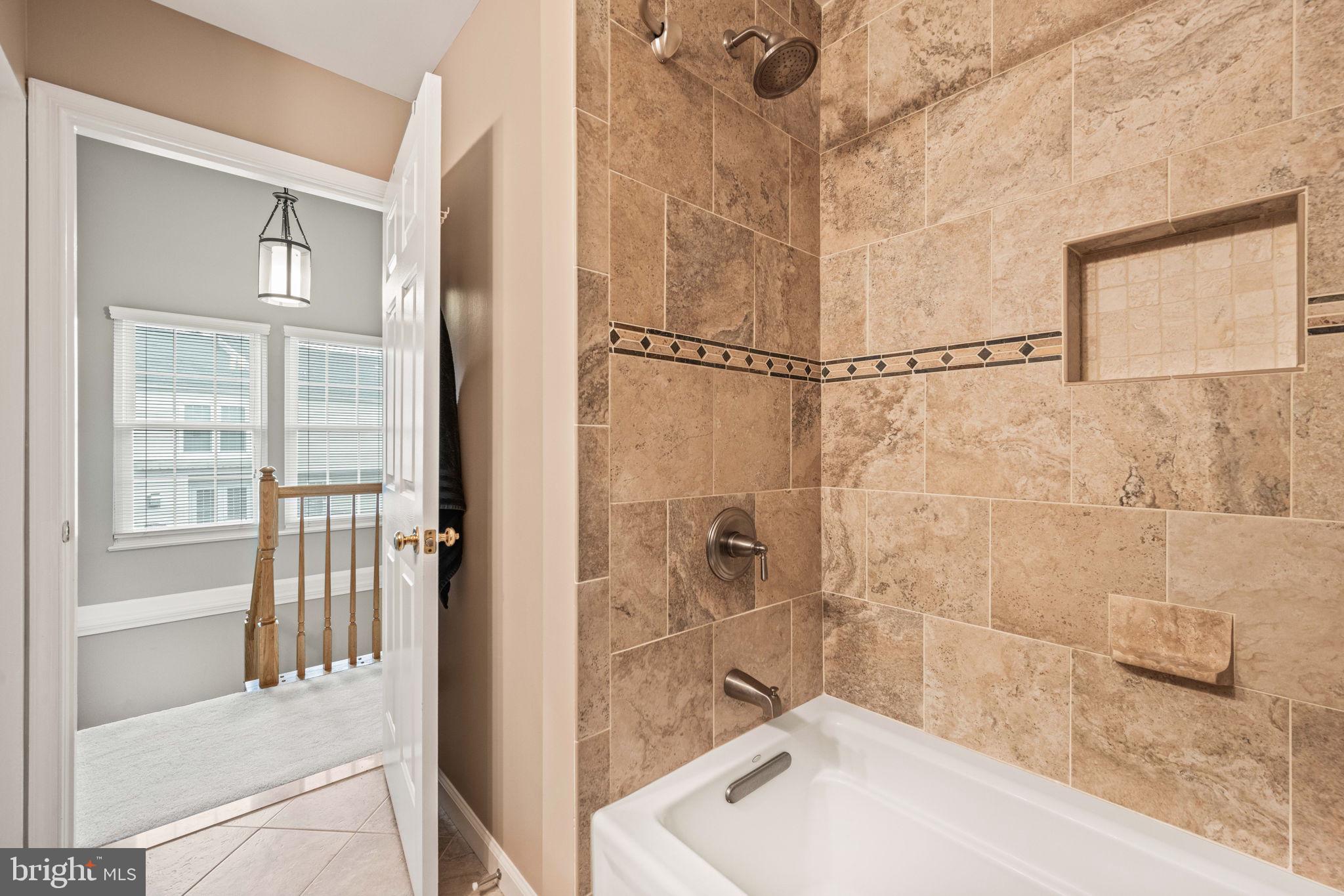 913 Rolfe Place Alexandria, VA 22314 - Photo 31 of 49 Tub show and linen closet