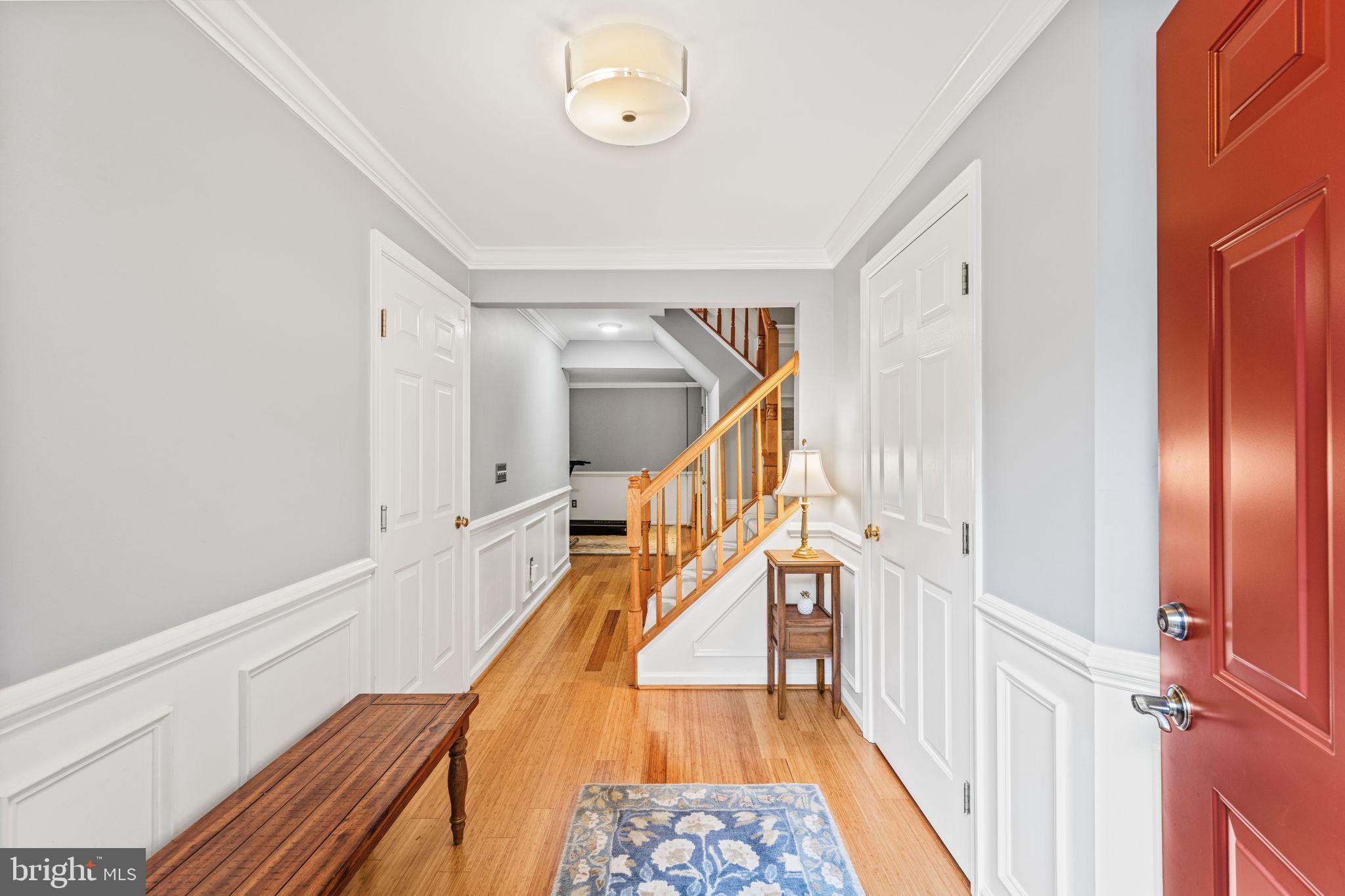 913 Rolfe Place Alexandria, VA 22314 - Photo 4 of 49 Foyer with engineered wood floors, large closets