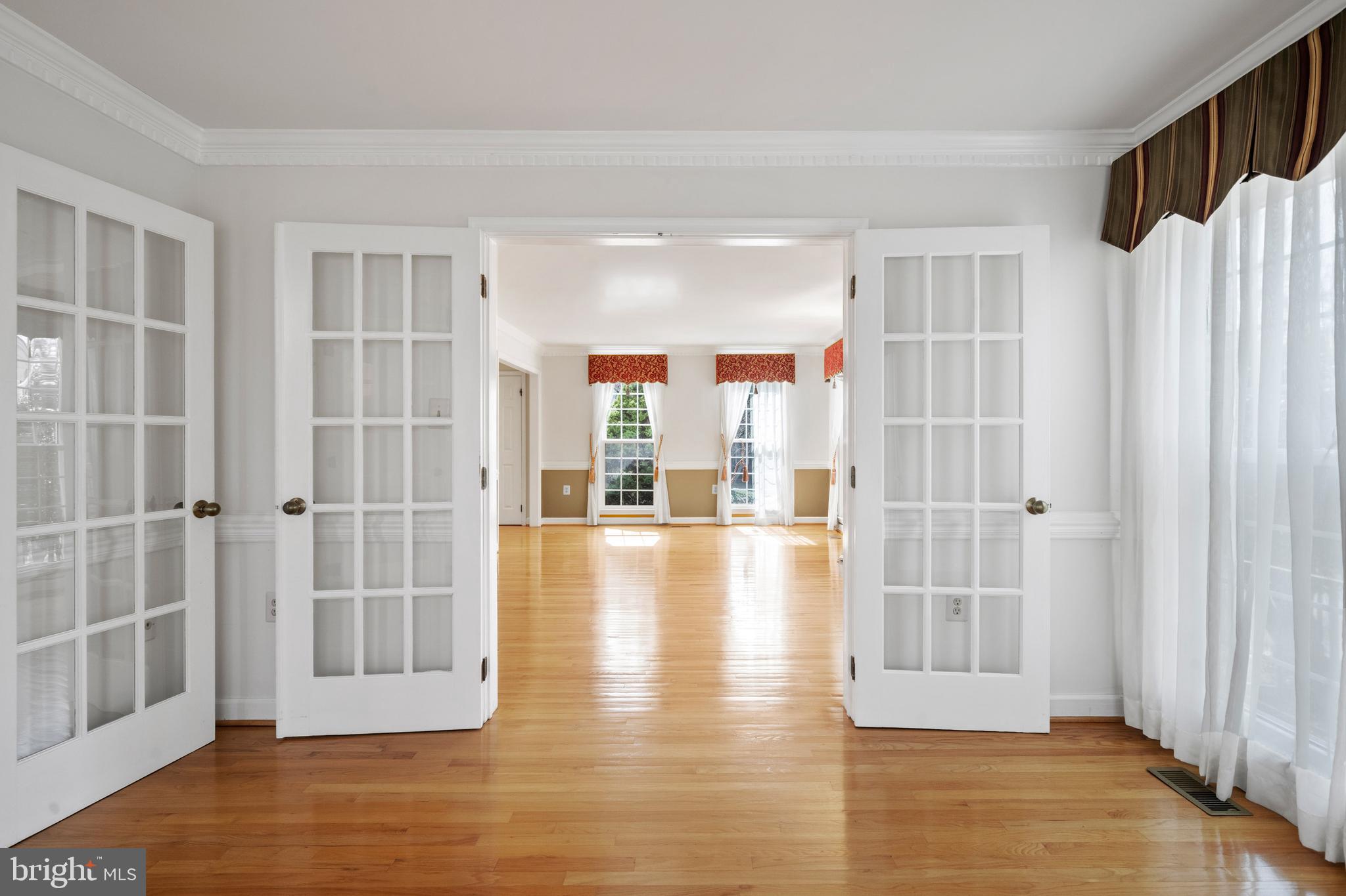 109 Englefield Drive Gaithersburg, MD 20878 - Photo 17 of 67 a view of empty room with wooden floor and fan