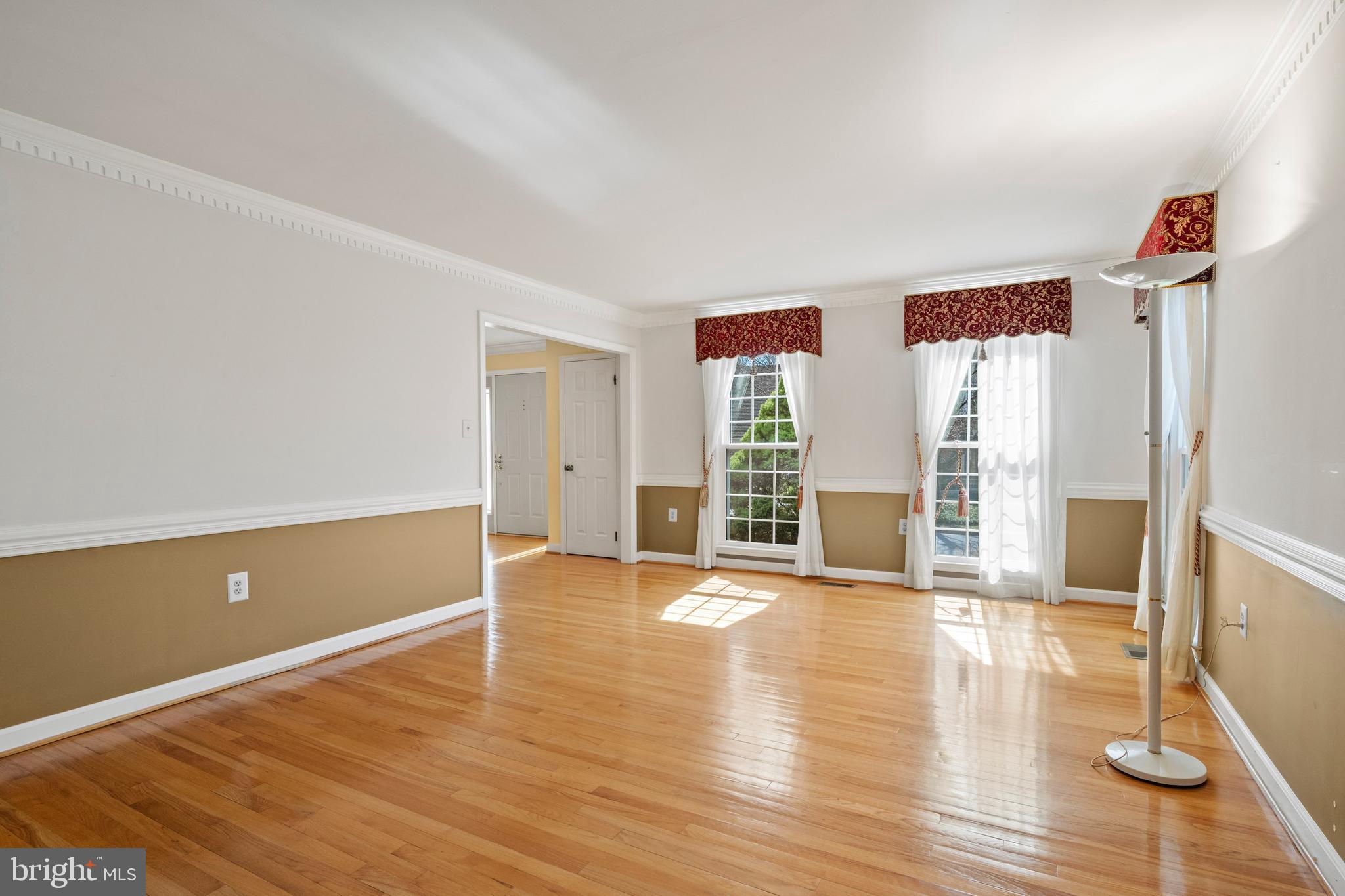 109 Englefield Drive Gaithersburg, MD 20878 - Photo 23 of 67 an empty room with wooden floor and windows