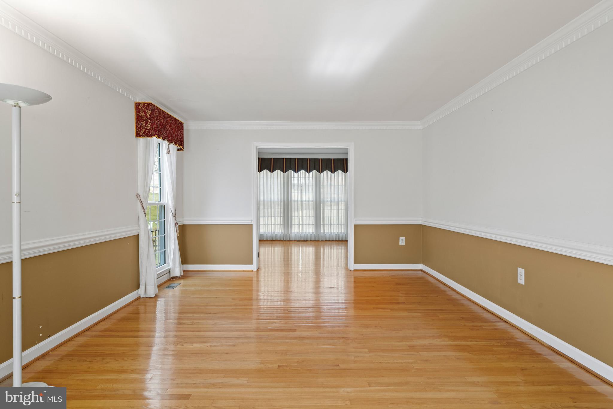 109 Englefield Drive Gaithersburg, MD 20878 - Photo 24 of 67 a view of empty room with wooden floor and fan