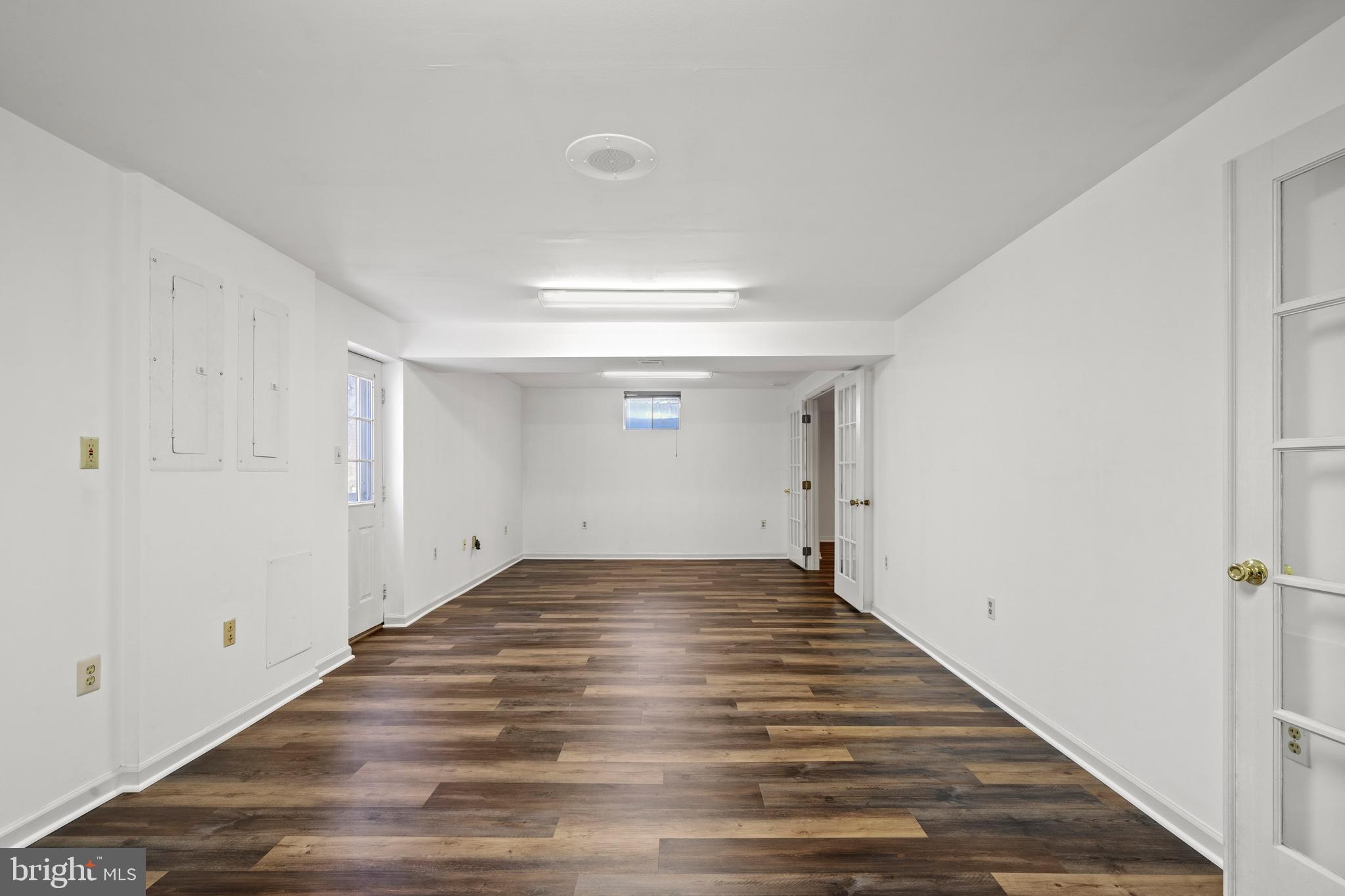 109 Englefield Drive Gaithersburg, MD 20878 - Photo 49 of 67 a view of an empty room and wooden floor
