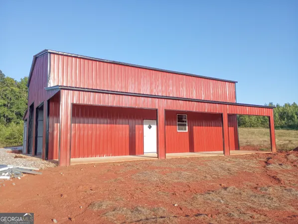 front view of a house with a street