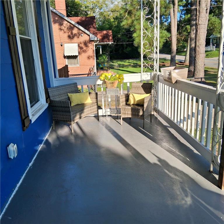 3435 Hillcrest Road Macon, GA 31204 - Photo 5 of 14 a view of a balcony with chairs