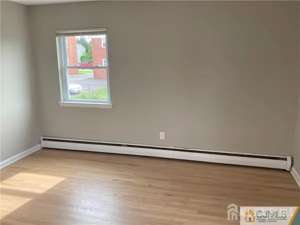 a view of an empty room and window