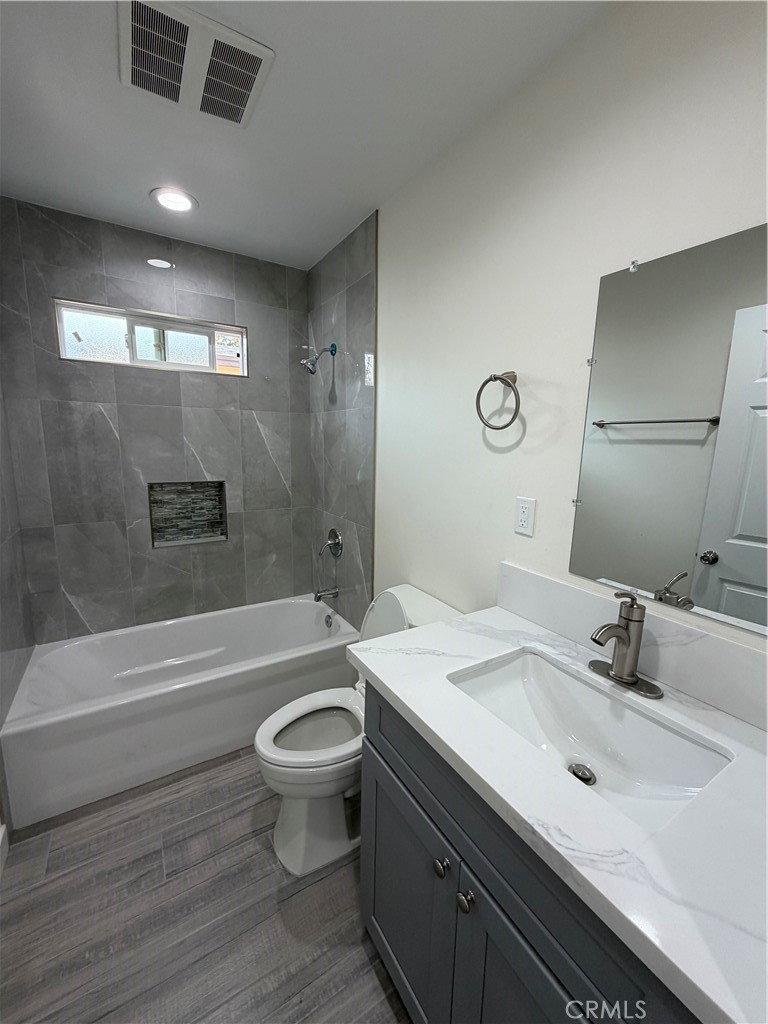 321 Elm Street Alhambra, CA 91801 - Photo 11 of 11 a bathroom with a sink a toilet and shower