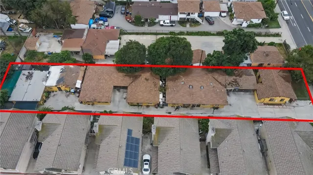 an aerial view of house and outdoor space