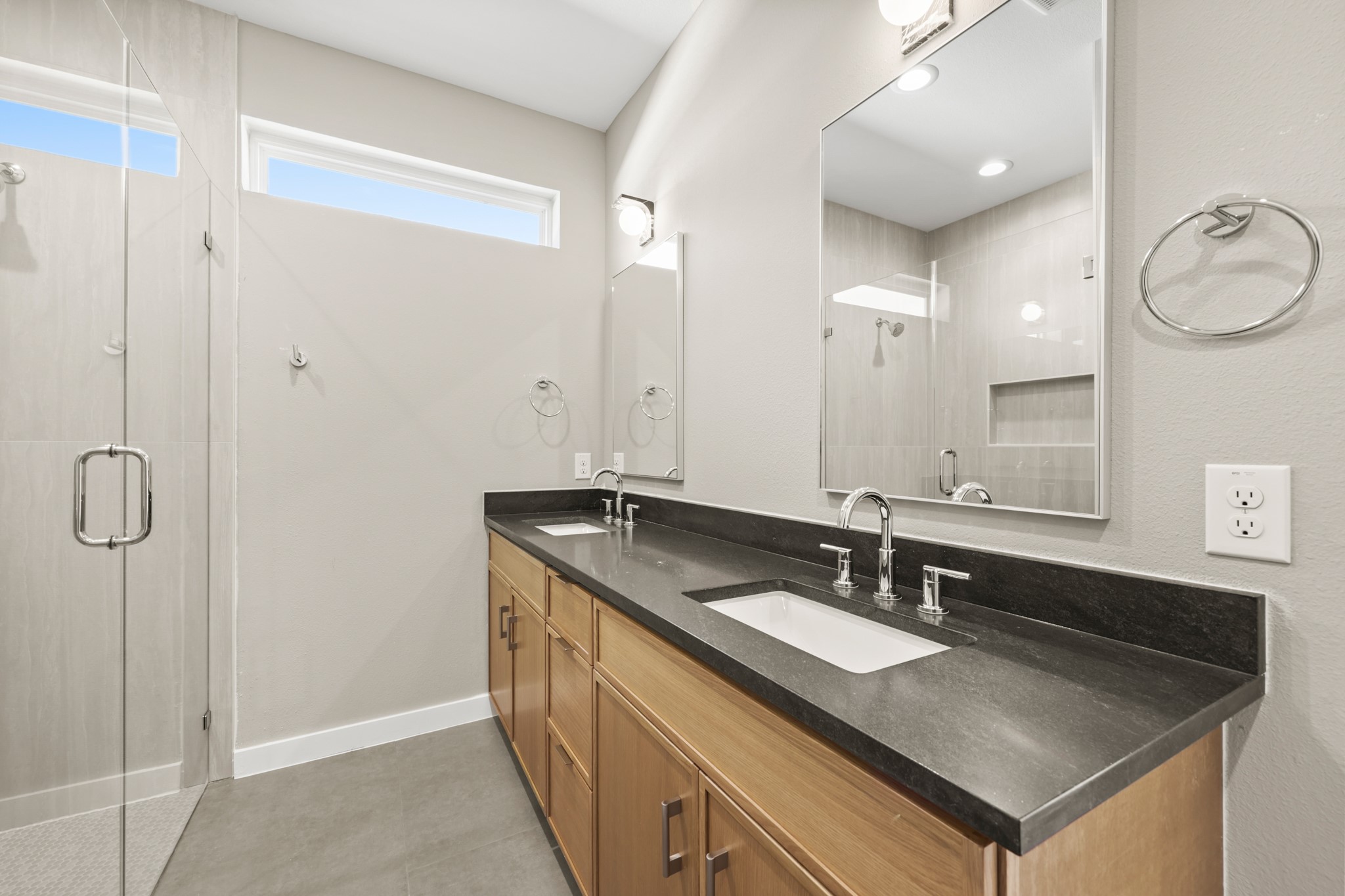 4801 Sara Drive, Unit B Austin, TX 78721 - Photo 12 of 40 a bathroom with a sink and a mirror