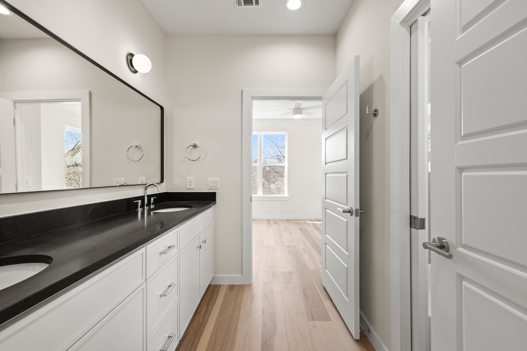4801 Sara Drive, Unit B Austin, TX 78721 - Photo 15 of 40 a bathroom with a sink and a mirror