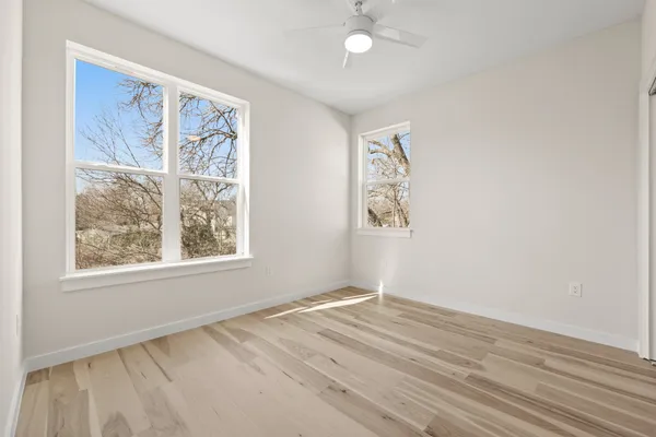 an empty room with windows