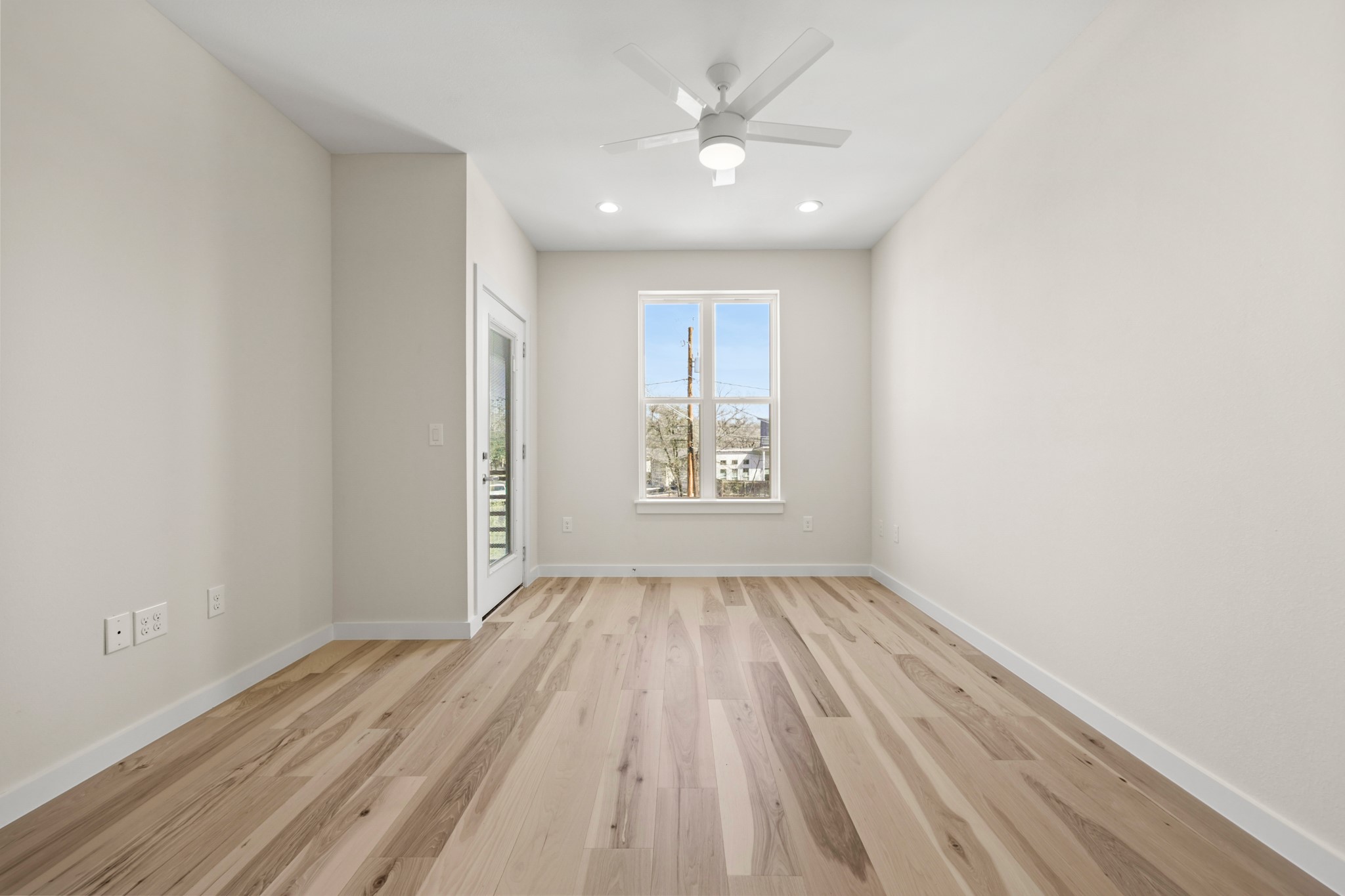 4801 Sara Drive, Unit B Austin, TX 78721 - Photo 9 of 40 an empty room with closet and windows