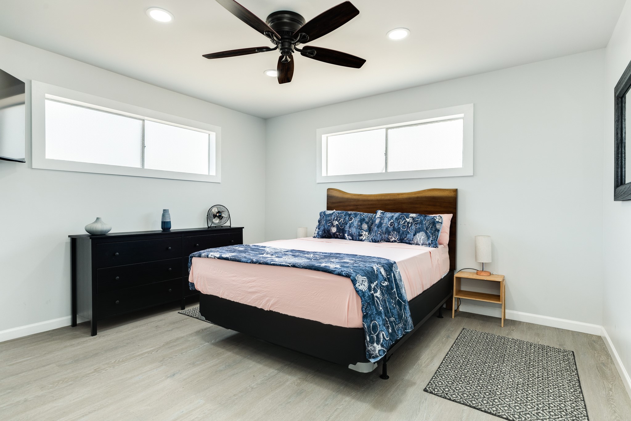 315 Seashell Drive Surfside Beach, TX 77541 - Photo 12 of 33 a spacious bedroom with a bed and a window