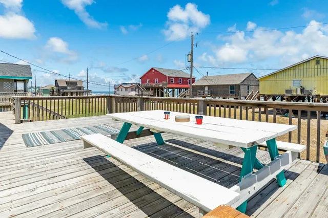 a view of multiple houses with outdoor space