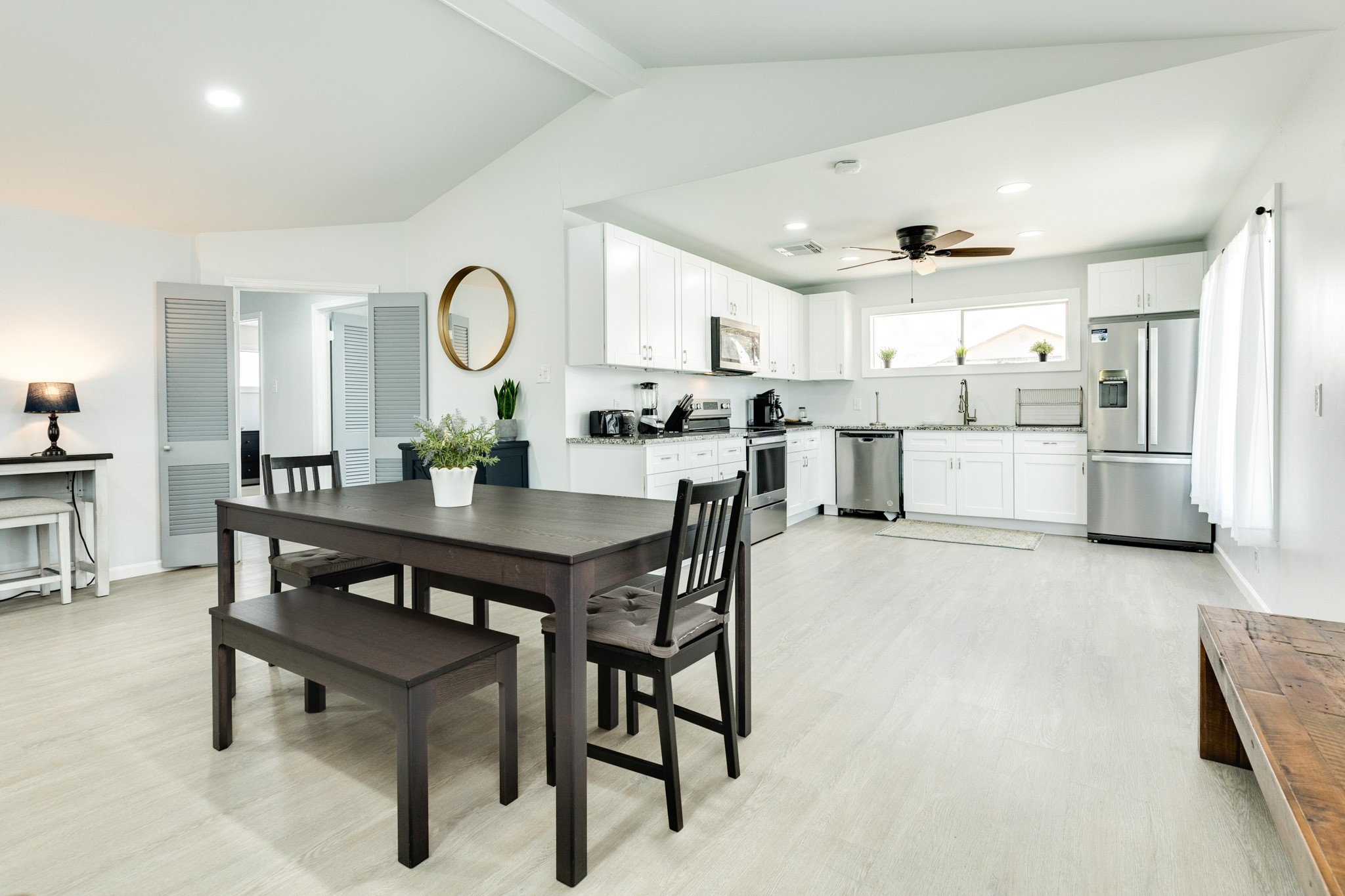 315 Seashell Drive Surfside Beach, TX 77541 - Photo 7 of 33 a view of a dining room kitchen and a window