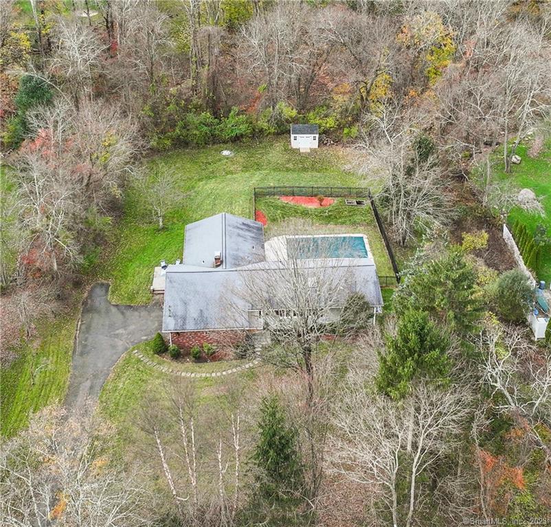 295 Wilton Road East Ridgefield, CT 06877 - Photo 1 of 1 a aerial view of a house with a yard