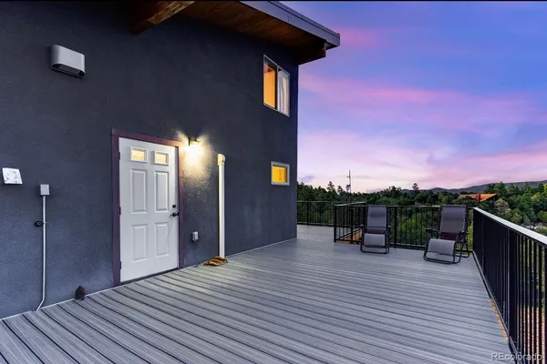 a view of a terrace with outdoor seating