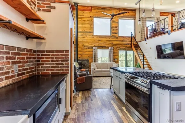 a kitchen with a stove and a kitchen