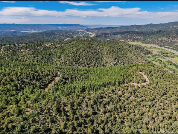 a view of a lake with mountains in the background