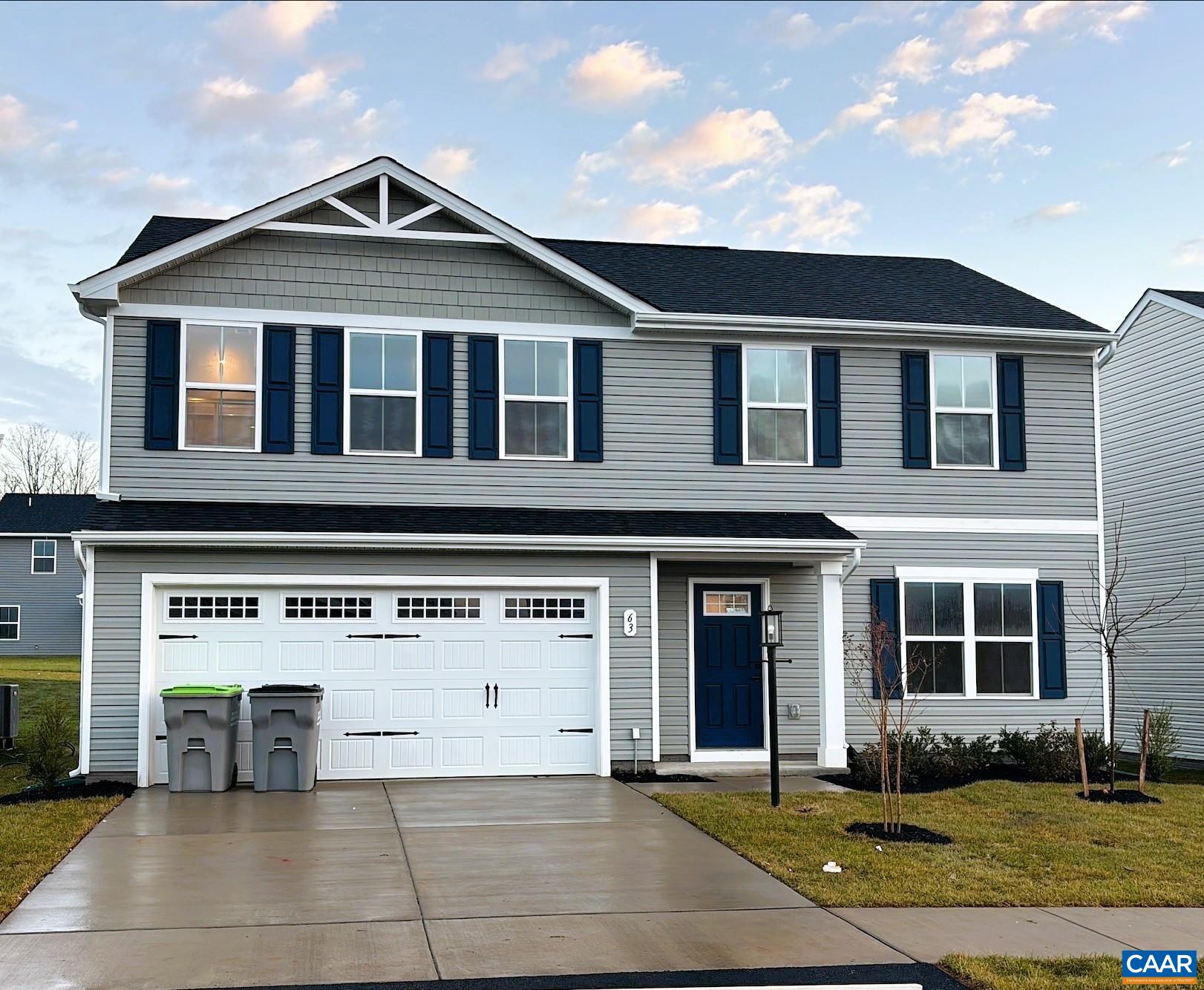63 Everglades Road Barboursville, VA 22923 - Photo 1 of 13 a front view of a house with garden