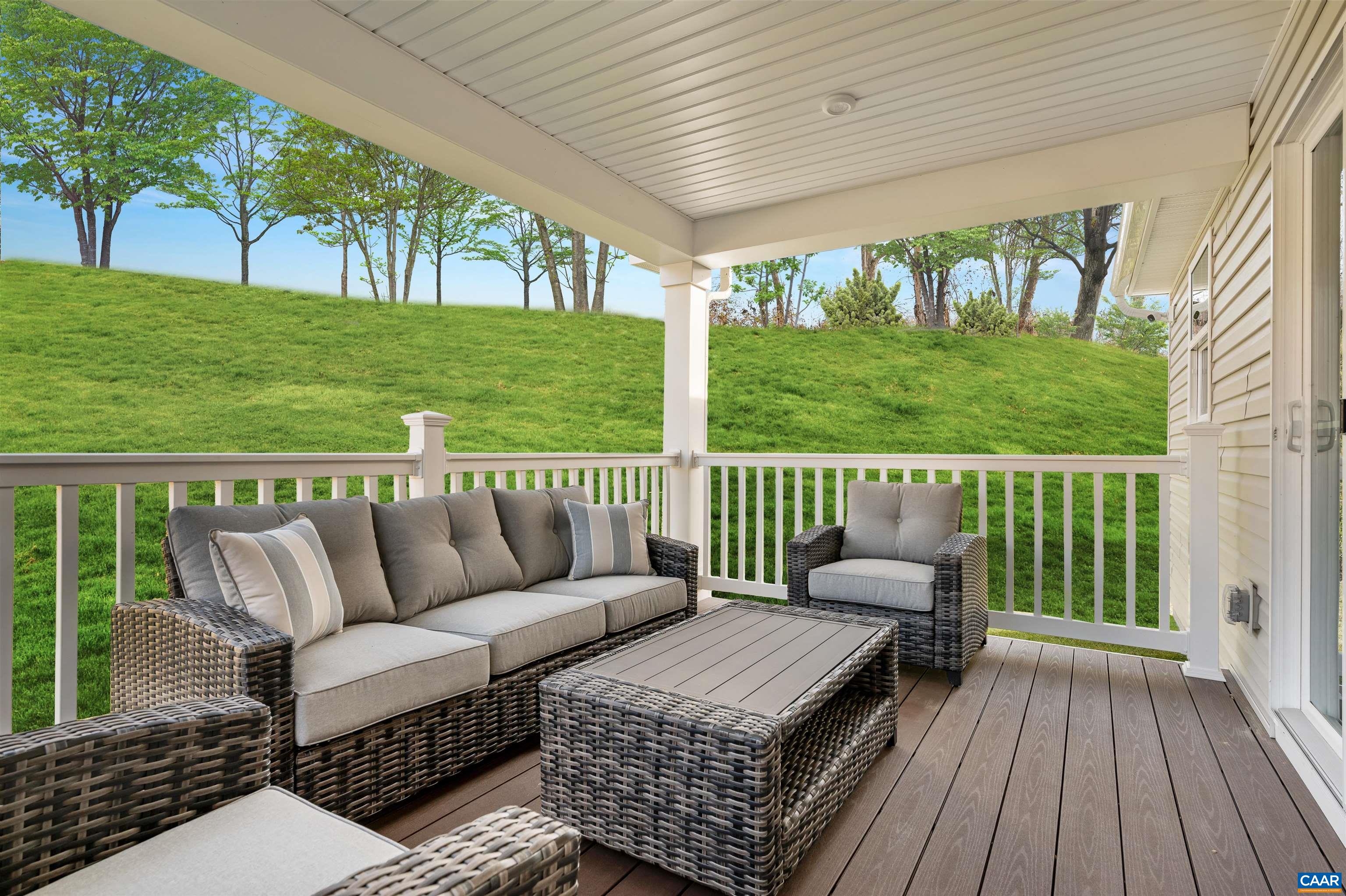 63 Everglades Road Barboursville, VA 22923 - Photo 12 of 13 a balcony with wooden floor and outdoor seating