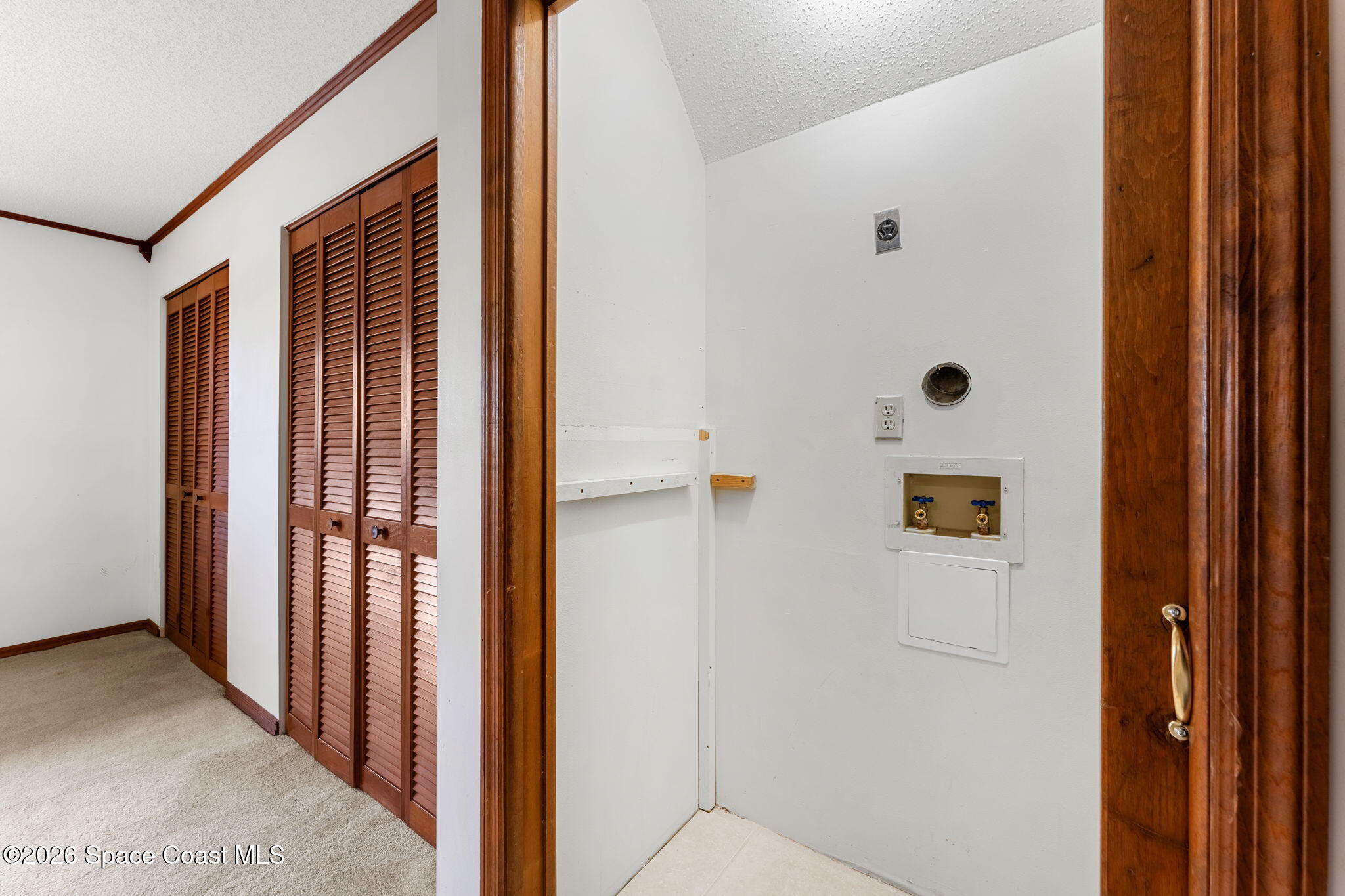 3121 Kirkland Road Northeast Palm Bay, FL 32905 - Photo 21 of 52 a view of walk in closet with white walls