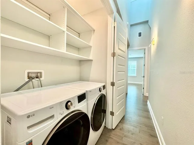 a utility room with dryer and washer