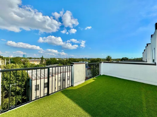 a view of a terrace with a garden