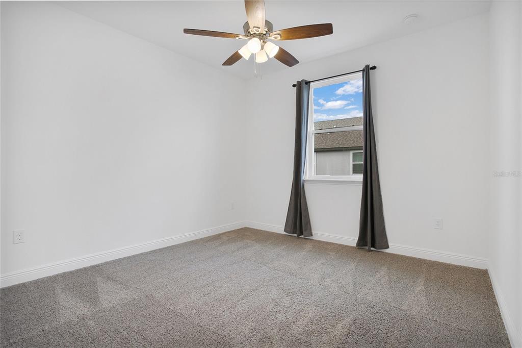 2460 Firstlight Way Winter Park, FL 32792 - Photo 11 of 24 a view of an empty room with a window