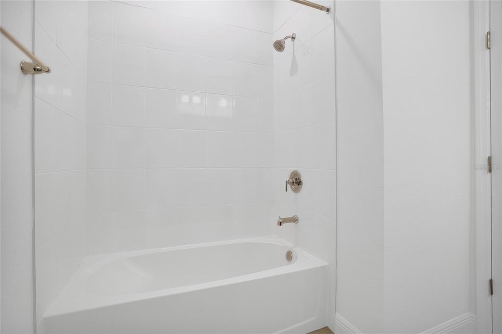 2460 Firstlight Way Winter Park, FL 32792 - Photo 14 of 24 a bathroom with a bathtub