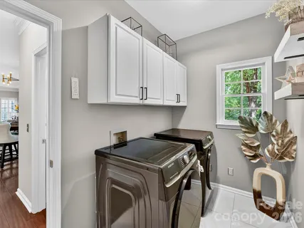 a view of a kitchen with electric appliances
