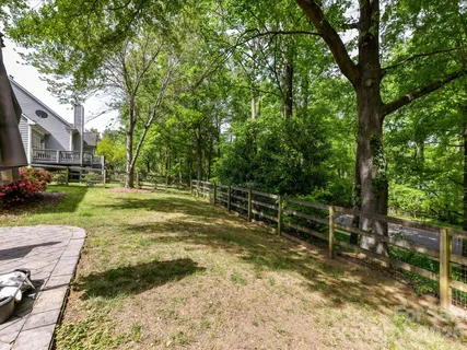 a view of backyard with green space