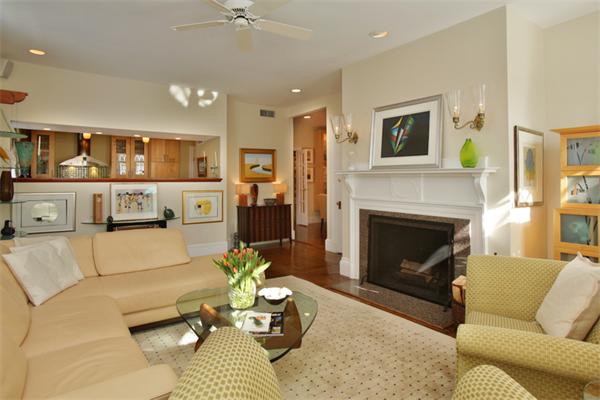 55 Garrison Road, Unit 2 Brookline, MA 02445 - Photo 3 of 12 a living room with furniture and a fireplace