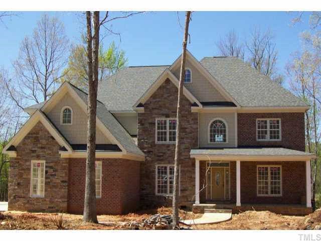1069 Tacketts Pond Drive Raleigh, NC 27614 - Photo 1 of 1 a front view of a house with a yard