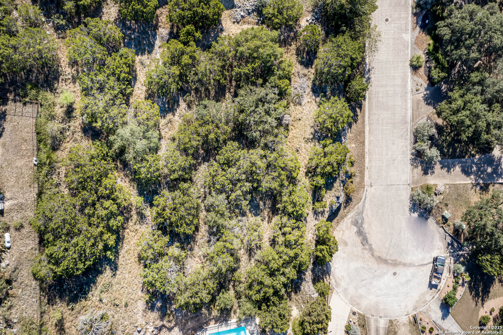 44 Trophy Ridge San Antonio, TX 78258 - Photo 11 of 13 an aerial view of a houses with yard