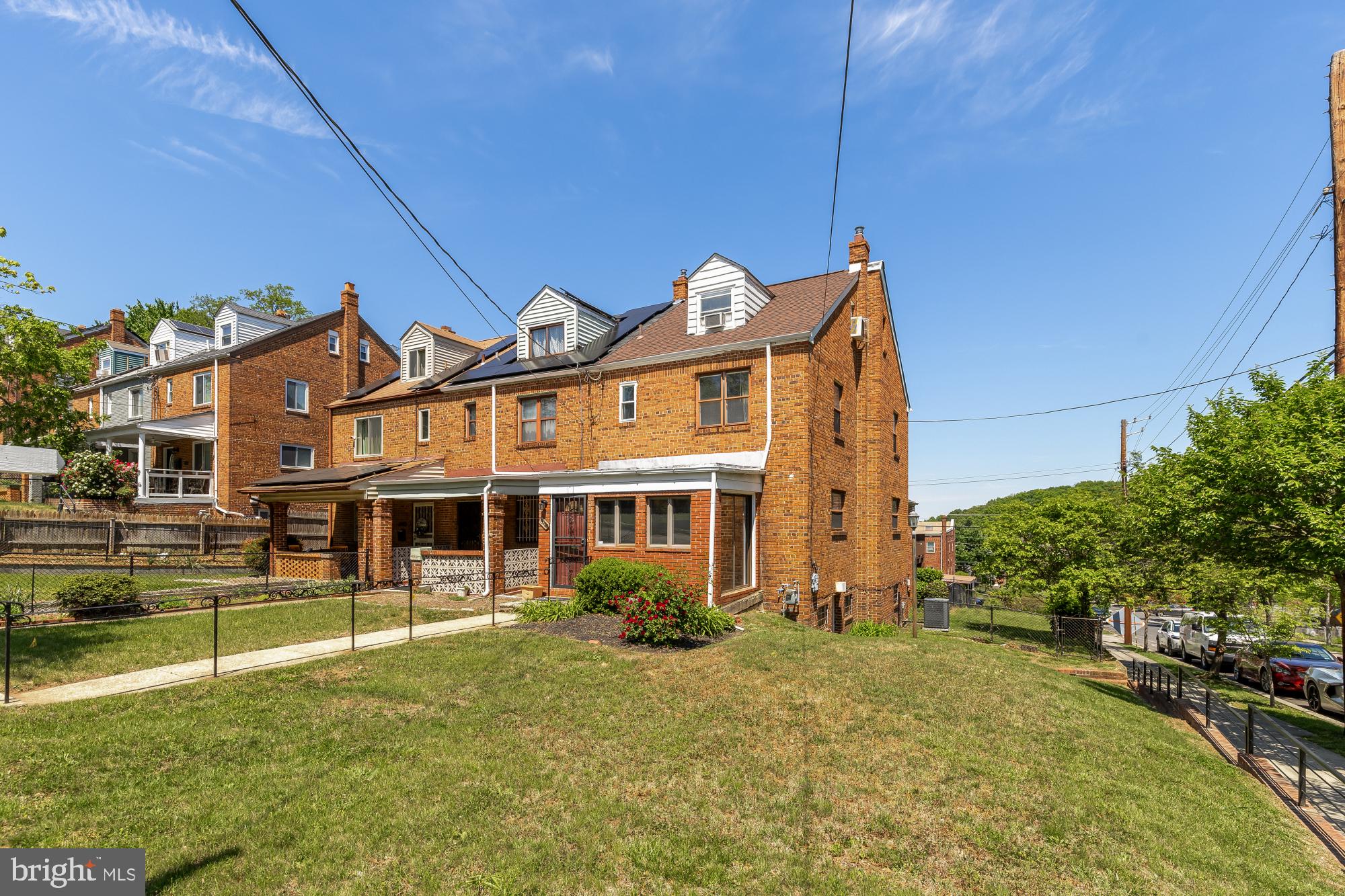 3984 Ames Street Northeast Washington, DC 20019 - Photo 1 of 16 a front view of a house with a yard