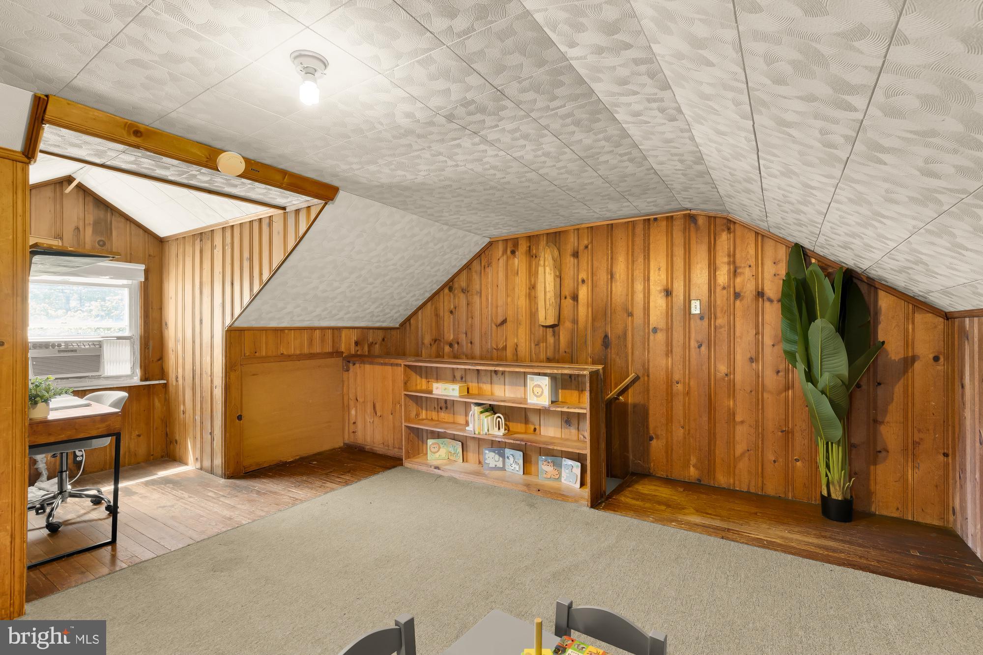 3984 Ames Street Northeast Washington, DC 20019 - Photo 13 of 16 an empty room with wooden floor and windows