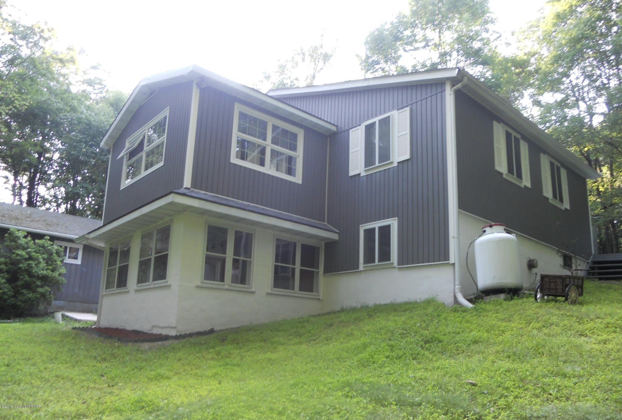 1180 Valleyview Circle Bushkill, PA 18324 - Photo 25 of 26 Rear Exterior summer shot