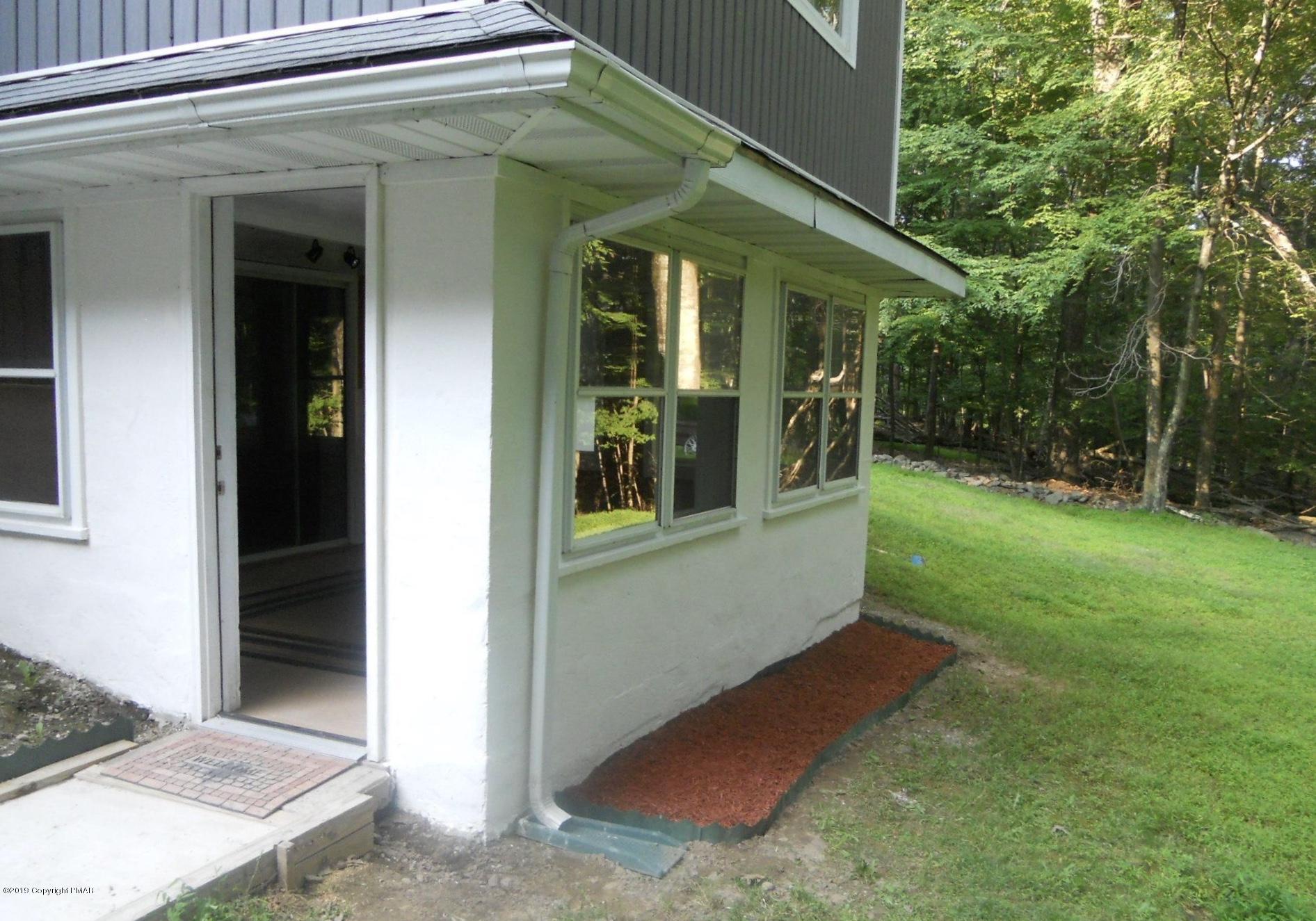 1180 Valleyview Circle Bushkill, PA 18324 - Photo 26 of 26 Enclosed porch entry-Lower Level